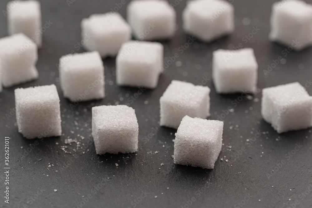 Sugar cubes on black background Sugar cubes on black background