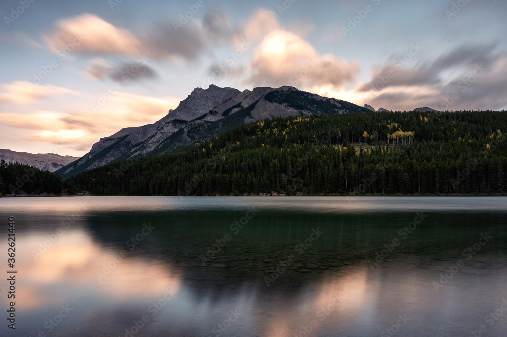 Castle mountain reflection on Two Jack Lake in evening at Banff national park