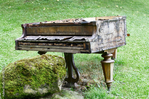 old rotten piano outdoor decay