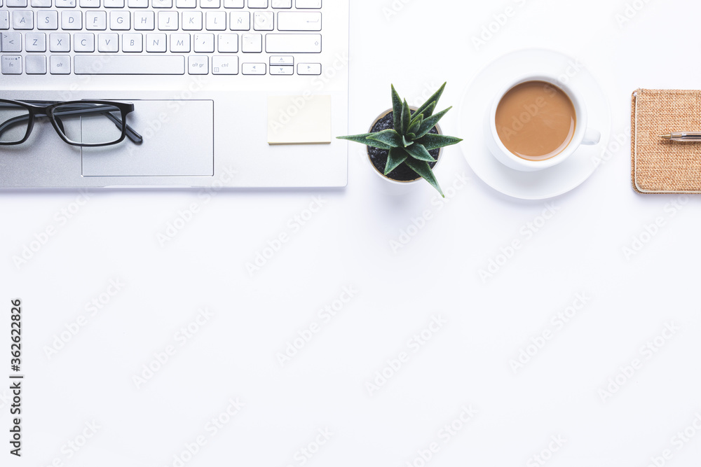 Fotografie Flat lay, Workplace with laptop, coffe and office supplies on withe desk