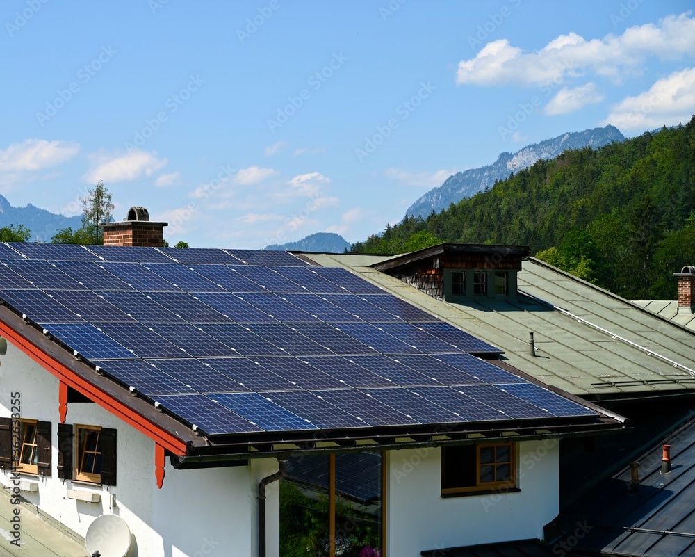 Solar cell panels on house roof.