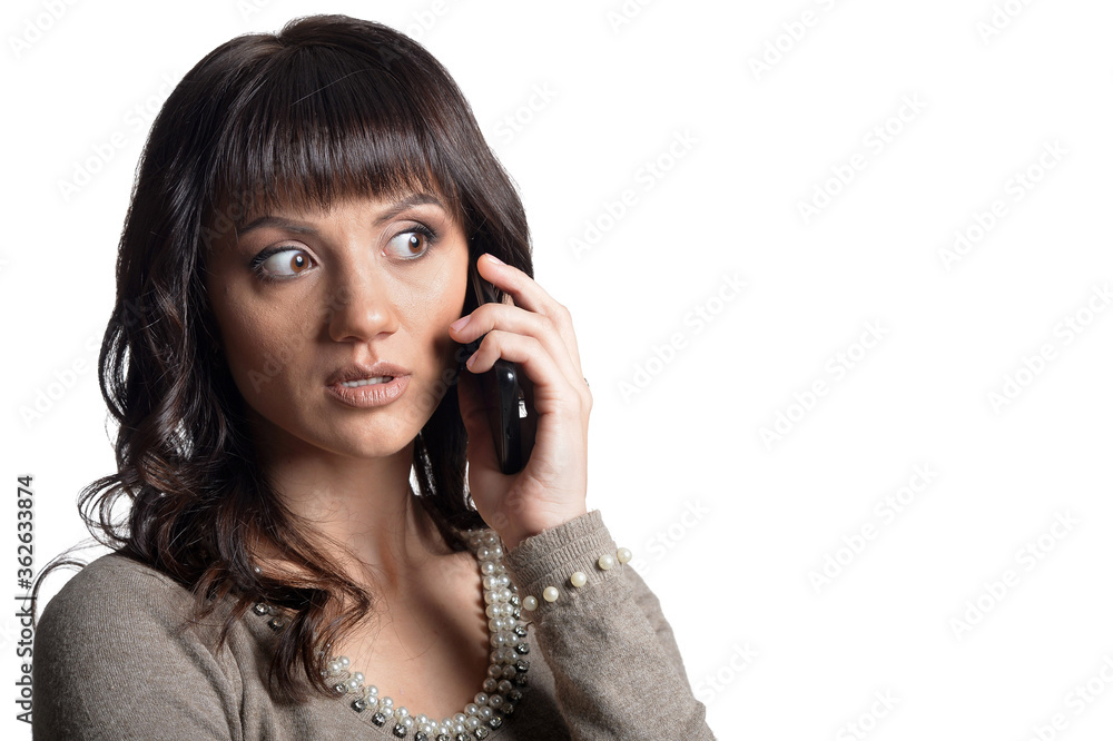 Portrait of beautiful young woman talking on phone Portrait of beautiful young woman talking on phone