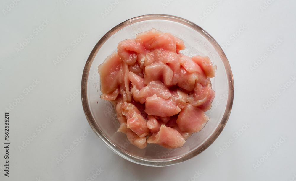 .Fresh pork in a glass cup top view .Fresh pork in a glass cup top view