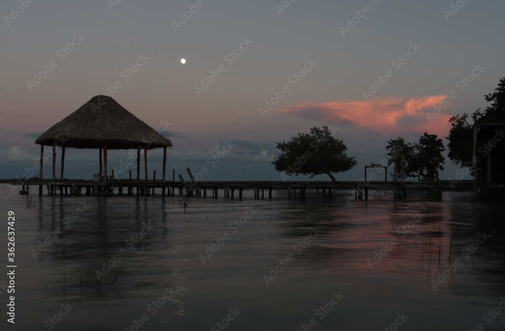 Sunset at Bacalar lake in Mexico