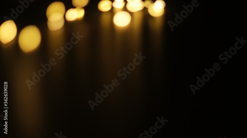 Natural Gold Color Bokeh Particles Effect Photo Overlays Background Glowing Abstract Lens Lights Defocused Circles and Blur Golden Glitter Beautiful Glamour Style. Use Screen Overlay Mode.