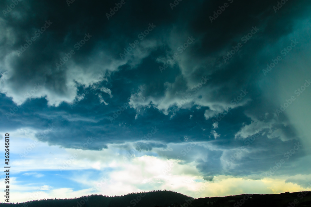 Severe thunderstorm developing over the front range of Rocky Mountains.