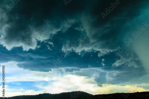 Severe thunderstorm developing over the front range of Rocky Mountains.
