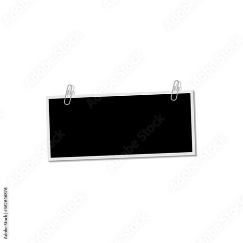 Photo frame with clip on white background with shadow effect. Template, blank.