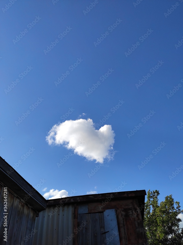 factory chimney on blue sky