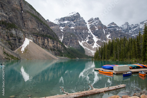 A picture of Moraine lake and ten peaks with boats. AB Canada 