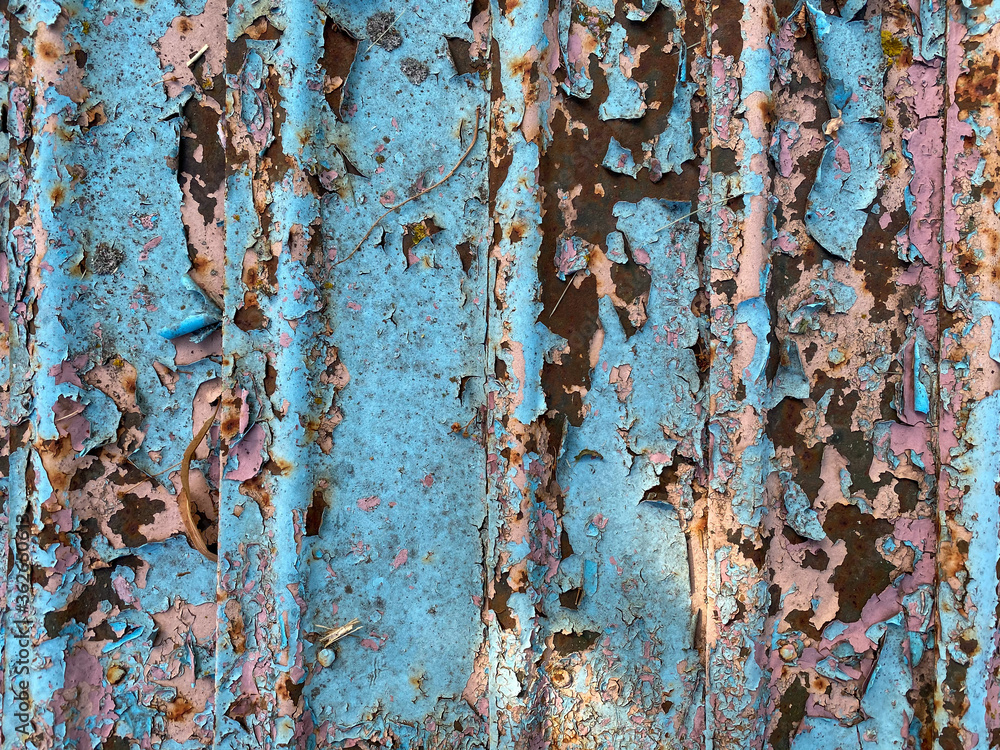 Old painted roof with cracks and rust. Old painted roof with cracks and rust.