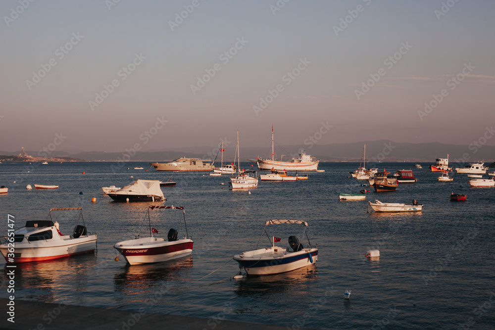 boats in the harbor at sunset in Turkey Tuzla