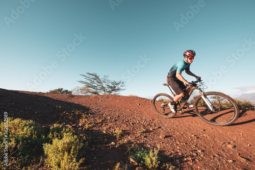 mountain biker riding on a single track © danedwards