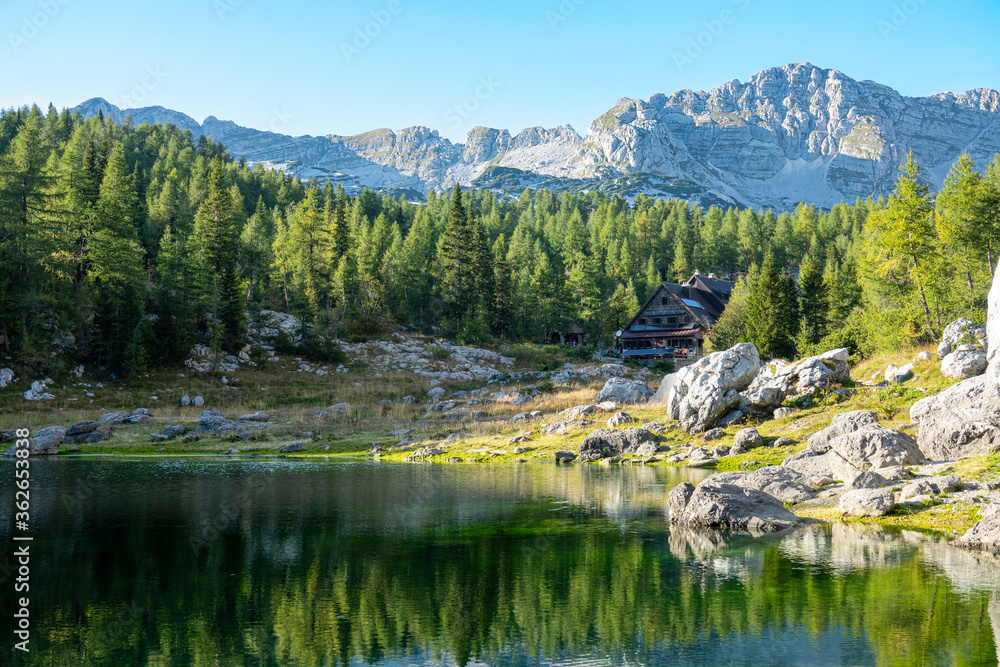 Breathtaking view of a scenic lake in Triglav National Park on sunny summer day.