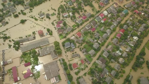 The flooded city of Halych from a height. Flood in Ukraine 06.24.2020. The Dniester River overflowed due to heavy rainfall and flooded houses and roads. Aerial video photo
