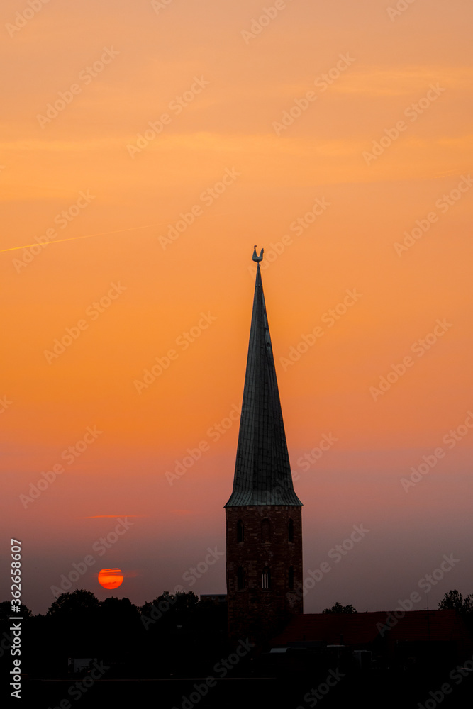 Skyline sunset with a silhouette of a historic church