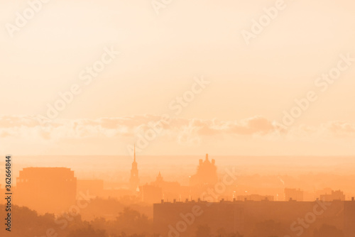 Obraz na płótnie Beautiful orange sunset over the city of Ryazan in summer. Ryazan Kremlin at sunset. Orthodox Church in the sunset w salonie
