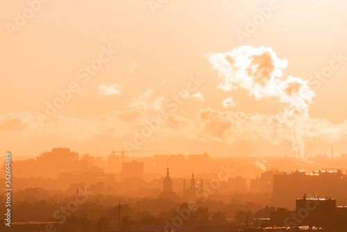 Obraz na płótnie Beautiful orange sunset over the city of Ryazan in summer. Orthodox Church in the sunset w salonie