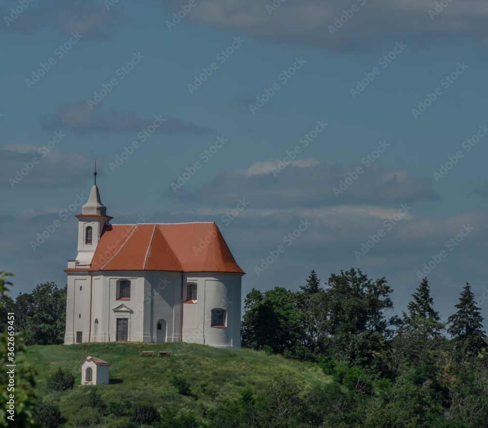 Chapel of Saint Antonin over Dolni Kounice village in south Moravia summer day