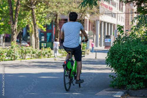 Wallpaper Mural Young man with the bicycle Torontodigital.ca