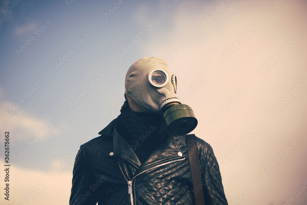 close up. casual guy in a gas mask close up. casual guy in a gas mask