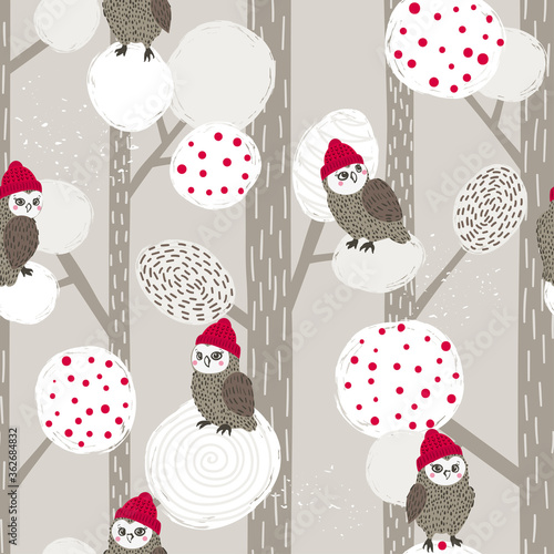 Seamless abstract Christmas pattern with cute owls and trees.