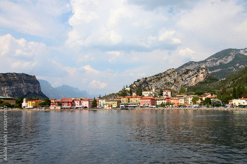 Lake Garda, in northern Italy surrounded by hills and villages with boats in the water Lake Garda, in northern Italy surrounded by hills and villages with boats in the water
