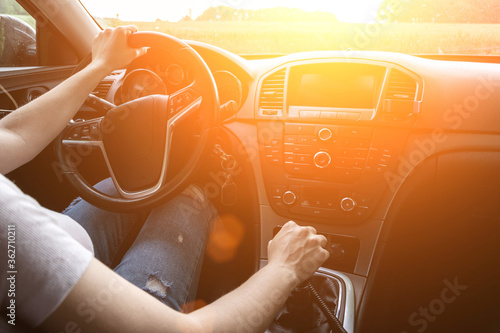 Driver car. Fun drive in summer vacation ride day. Happy young woman have road travel trip inside car in sunny day.