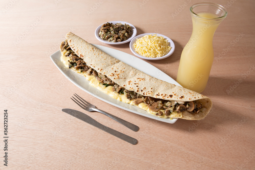 Mushroom and cheese machete quesadilla. Machete is a very long version of a quesadilla Stock