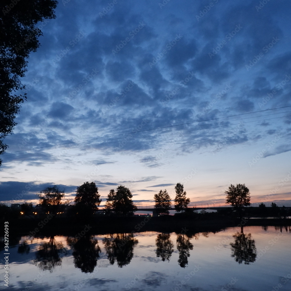 Obraz premium sunset at the river