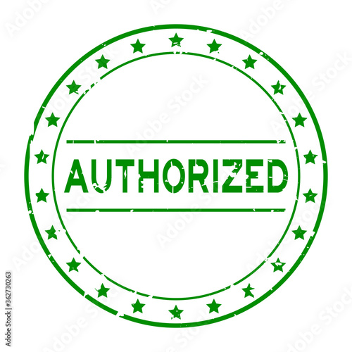 Grunge green authorized word round rubber seal stamp on white background