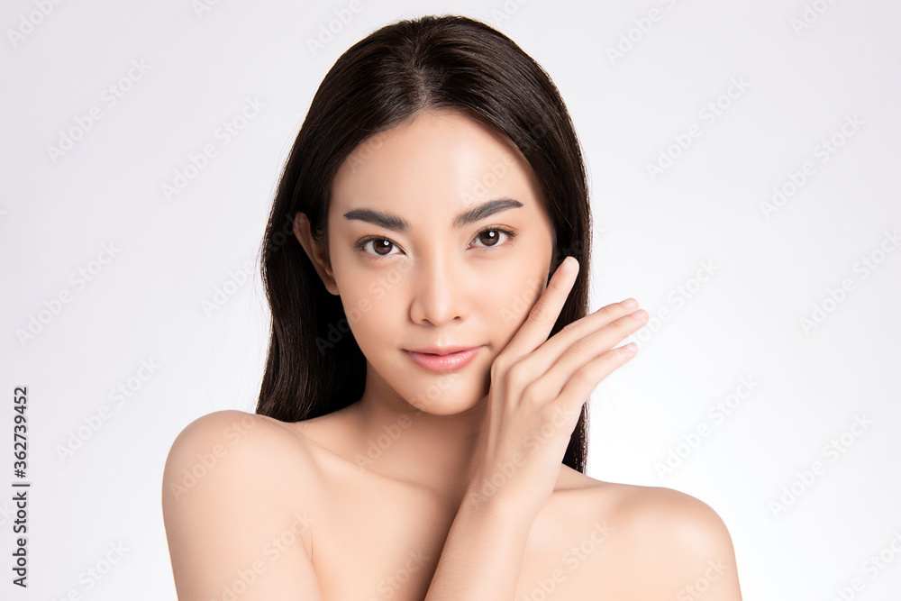 Close up Beautiful Young asian Woman touching her clean face with fresh Healthy Skin, on white background, Beauty Cosmetics and Facial treatment Concept Close up Beautiful Young asian Woman touching her clean face with fresh Healthy Skin, on white background, Beauty Cosmetics and Facial treatment Concept