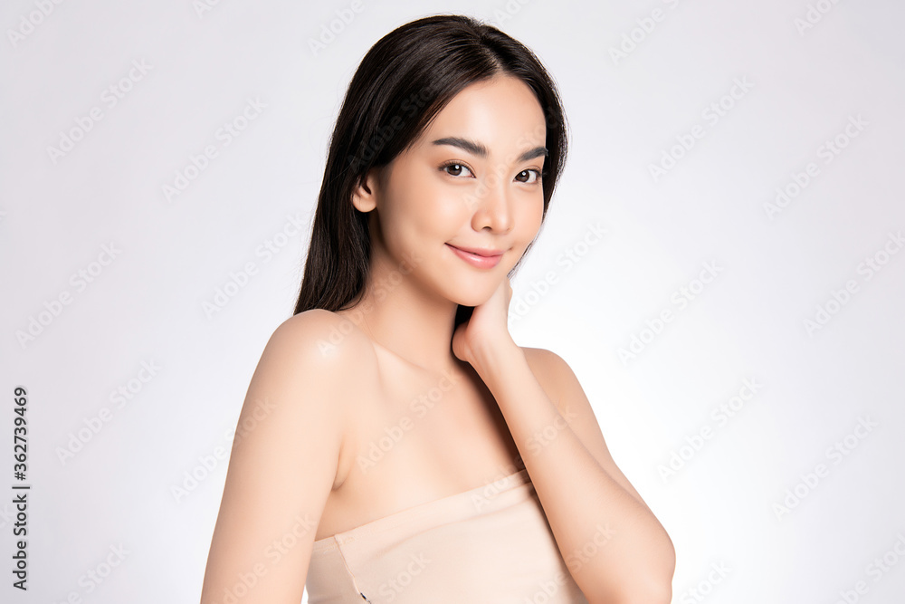 Beautiful Young Asian Woman touching her body with fresh Healthy Skin, isolated on white background, Beauty Cosmetics and Facial treatment Concept. Beautiful Young Asian Woman touching her body with fresh Healthy Skin, isolated on white background, Beauty Cosmetics and Facial treatment Concept.