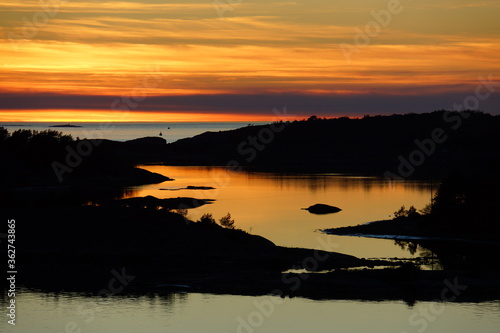 Sunset and dramatic sky of the archipelago.