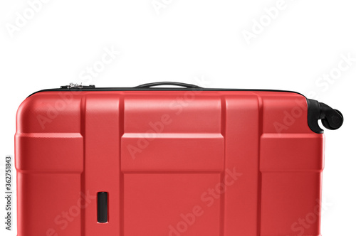 Fragment of red plastic valise on wheels isolated on white background