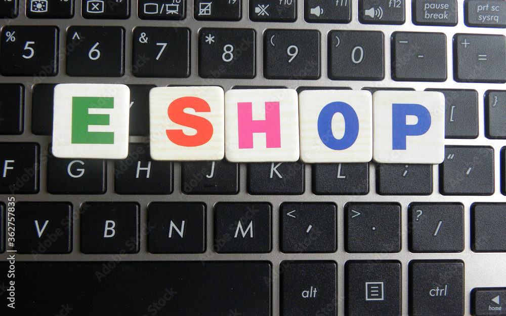 Word E Shop on keyboard background Word E Shop on keyboard background