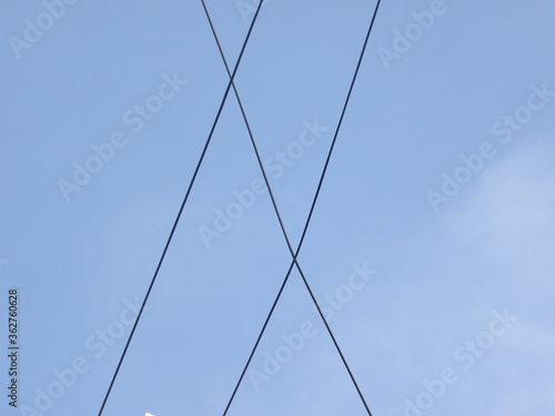 Wallpaper Mural Electrical cables on blue sky background Torontodigital.ca