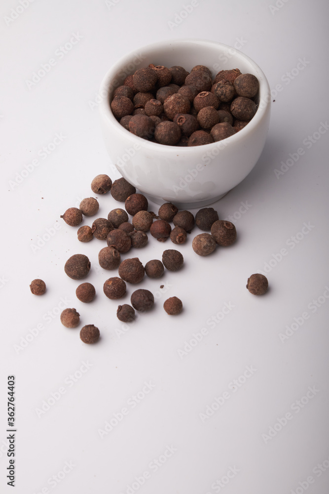 black pepper peas close up on a white background black pepper peas close up on a white background