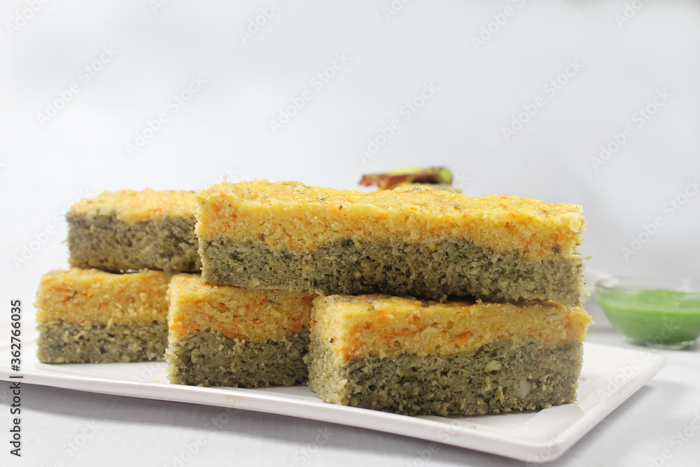 Sandwich Khaman or Sandwich Dhokla is an Indian Popular snack Originated in Gujarat.Served with chutney and kadhi