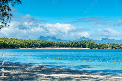 Mauritius, beach in Choisi, early morning - mountain range in the background
