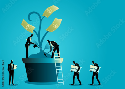 Businessmen nurturing money tree
