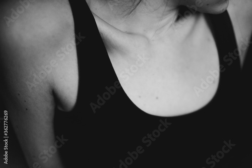 Details of body of beautiful girl, fashion and art, authentic black and white photo shoot