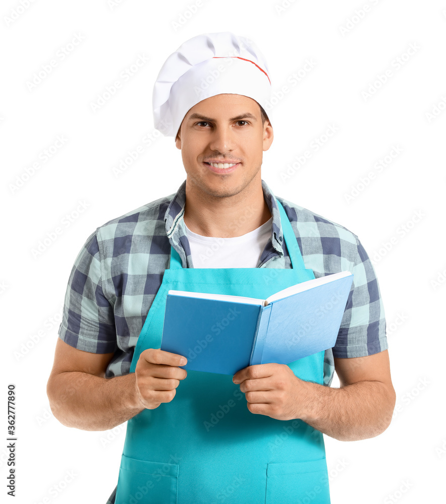Young man with recipe book on white background Young man with recipe book on white background