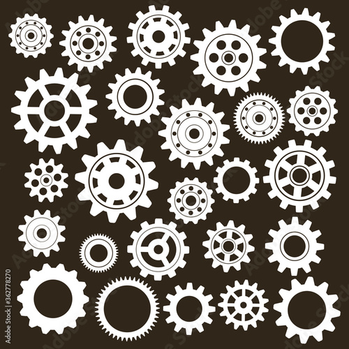 Set of gears on a black background. Vector icon