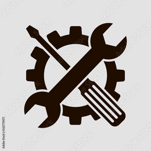 Gear, wrench and screwdriver. Flat vector icon