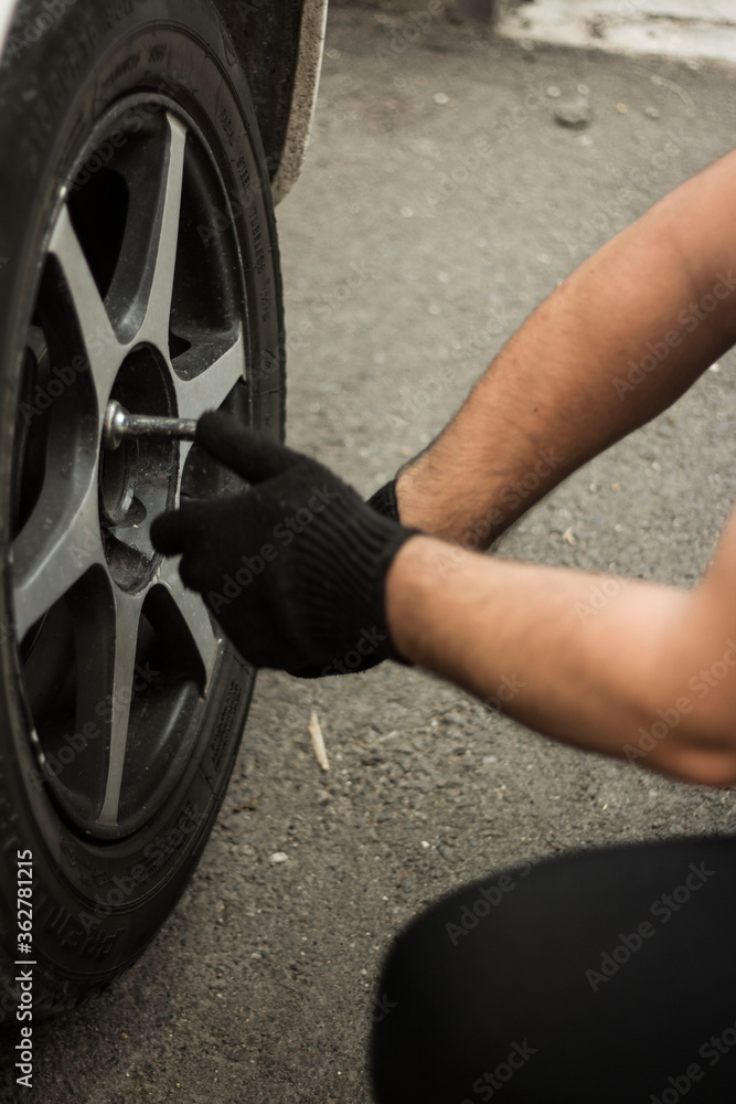 mechanic changing car tire mechanic changing car tire