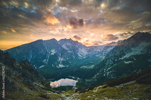 Sunset panorama in High Tatras mountains national park. Mountain popradske lake in Slovakia. photo