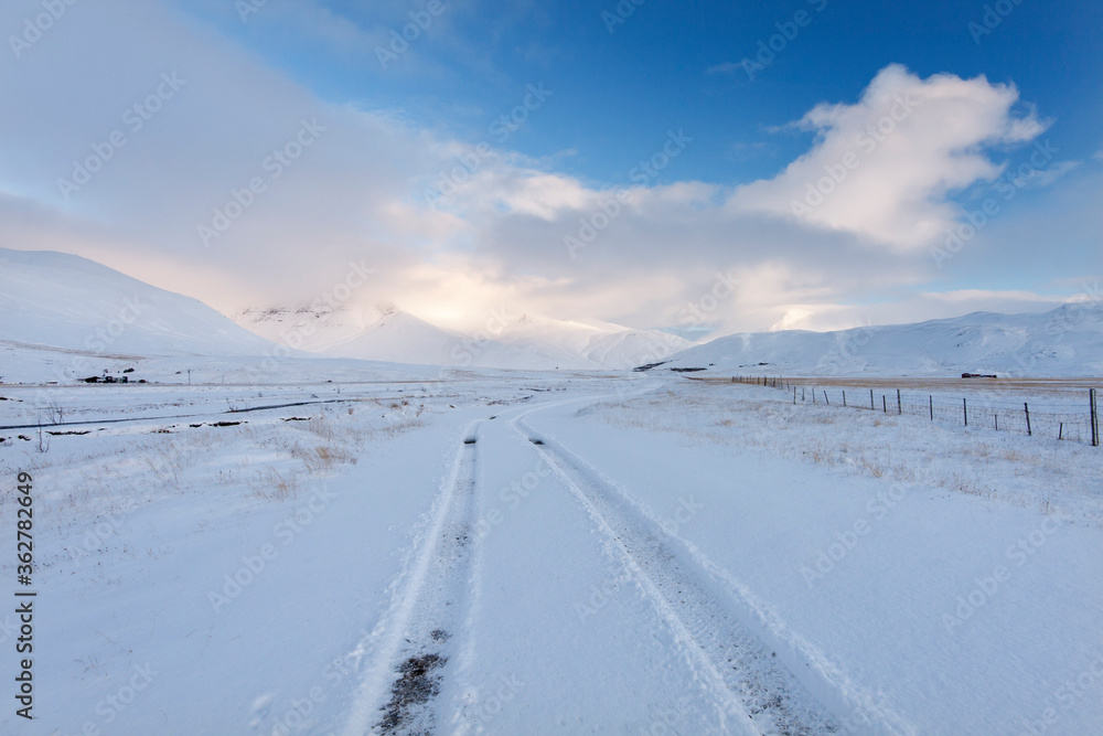 Winter road in the mountains, Iceland Winter road in the mountains, Iceland