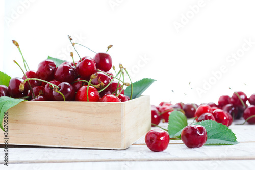 cherry in wooden container ...