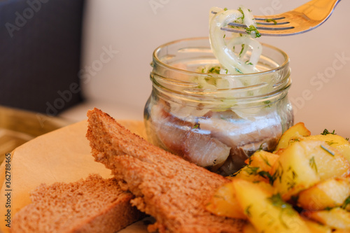 Plate of pieces of herring ...